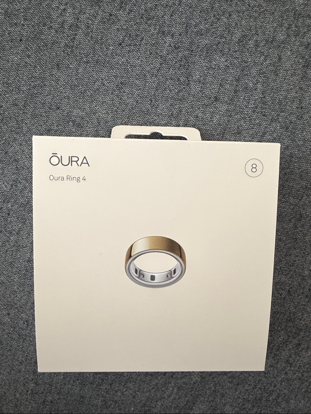 Oura ring 4 gold size 8 NEW IN BOX NEVER OPENED